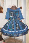 50.jpg (79997 bytes) Royal blue skirt & top, skirt has divided panels.